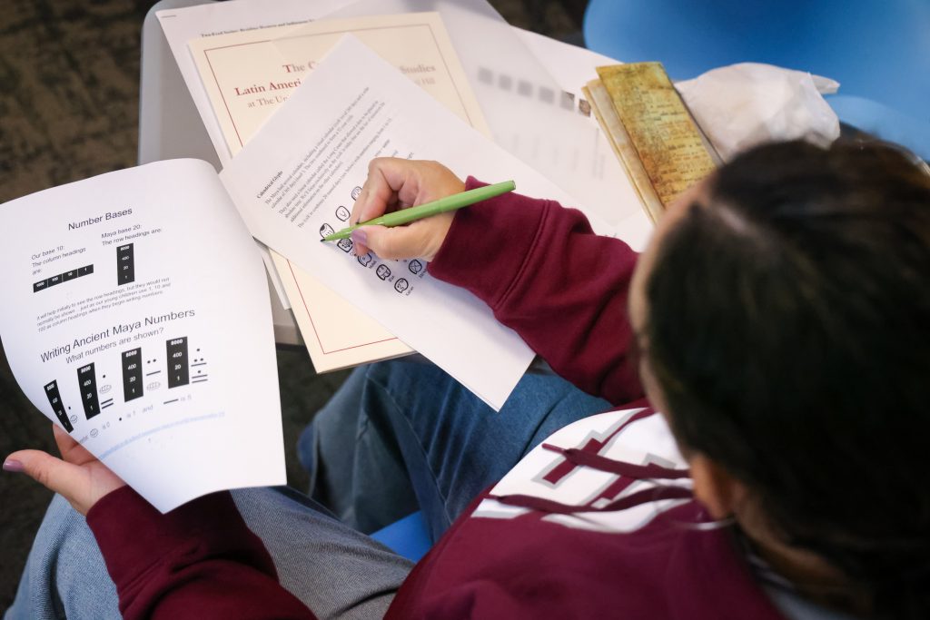 Workshop participant annotates their notes